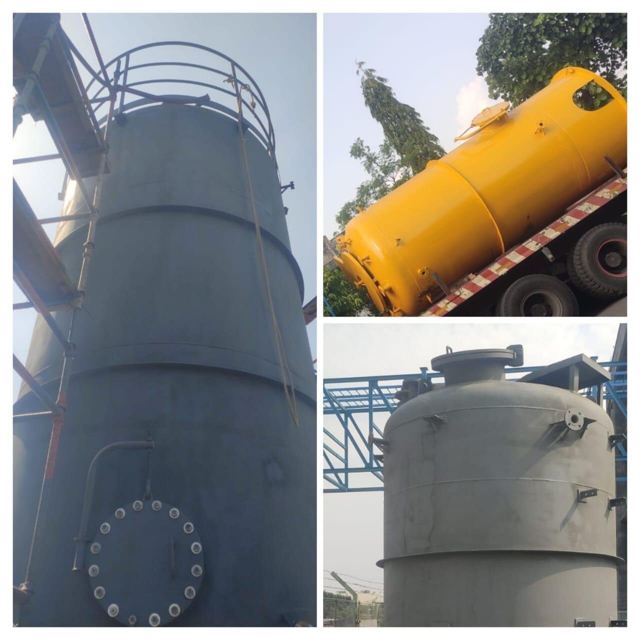 Large vessel being erected and aligned at site with a crane